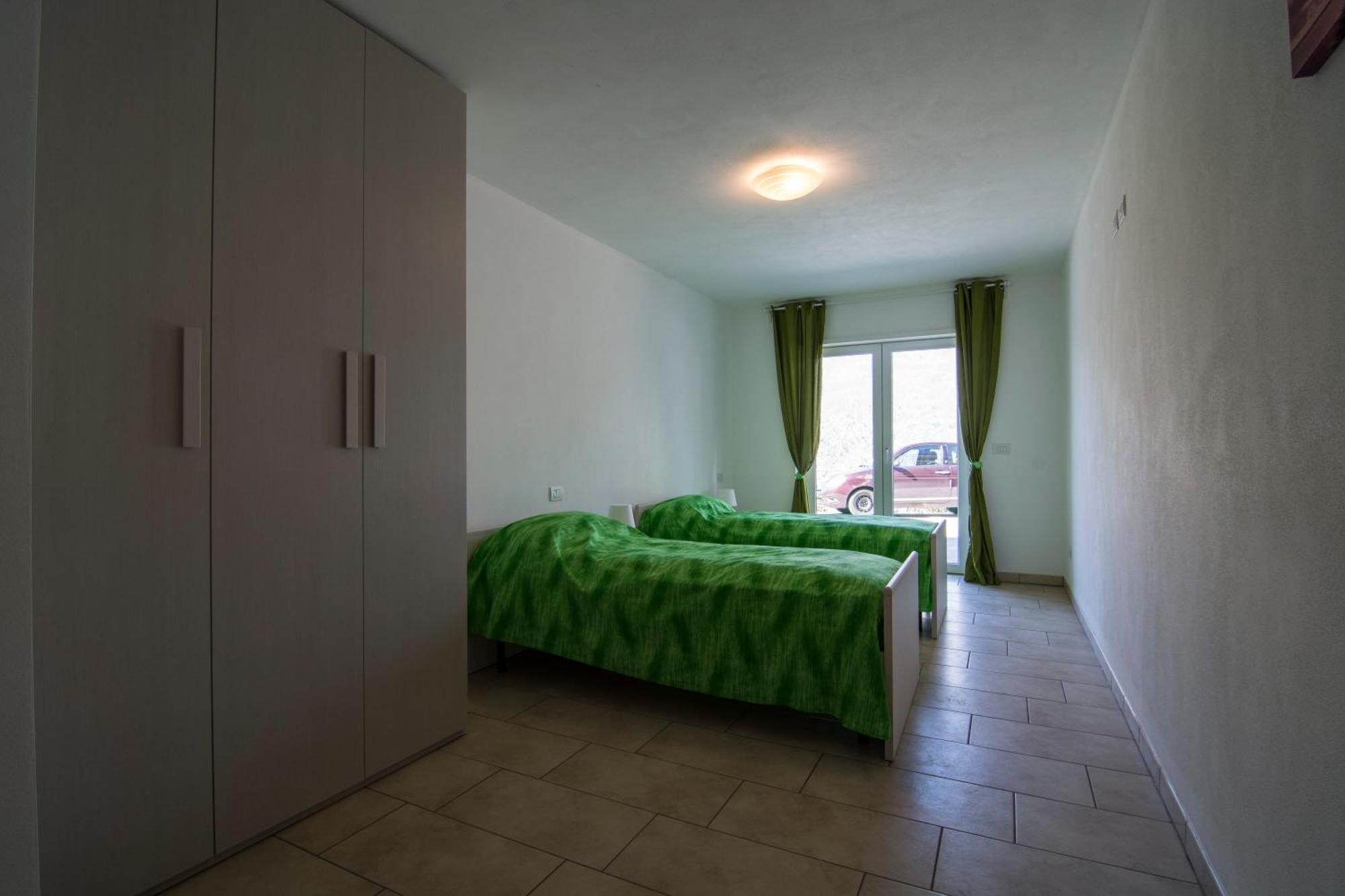 Residence Il Poggio Dorio Esterno foto